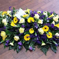 Yellow and Purple Casket Spray